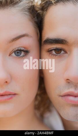 Jeune couple face à face, close-up Banque D'Images