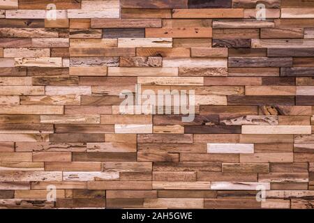 La texture du mur de brique en bois , fond de bois ,Belle Abstract tuiles, briques faites de différents types de bois. Banque D'Images