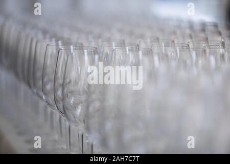 Close up of a series of rows of chalices lined for a wedding party Banque D'Images