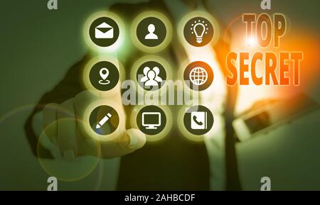La main conceptuel montrant Top Secret. Sens concept protégé par un haut degré de confidentialité hautement confidentiel Banque D'Images