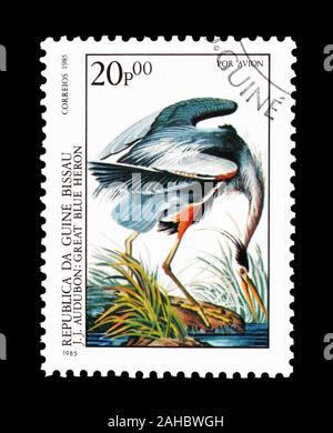 Timbre-poste annulé imprimé par la Guinée-Bissau, qui montre Great Blue Heron, vers 1985. Banque D'Images