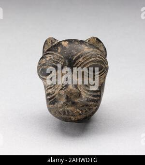 Chimú. Un fragment du navire Blackware sous la forme d'une tête de Puma. 1000-1400. Côte Nord. Pigment et céramique Banque D'Images