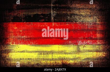 Allemagne flag peint sur old plank mur sombre Banque D'Images