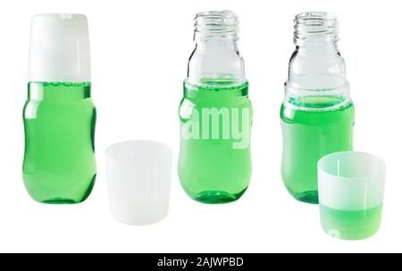 Bouteille en plastique vert avec rince-bouche pour les soins des dents isolées sur fond blanc. Banque D'Images