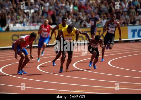 Usain Bolt et Michael Campbell (Jamaique) lors de la 2e chauffe Relais 4x100m hommes à l'IAAF Championnats du monde d'athlétisme le 6 août 201e au stade olympique à Londres, Grande-Bretagne Photo Laurent Lairys / DPPI Banque D'Images