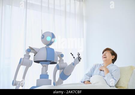 Hauts femme japonaise avec robot Banque D'Images