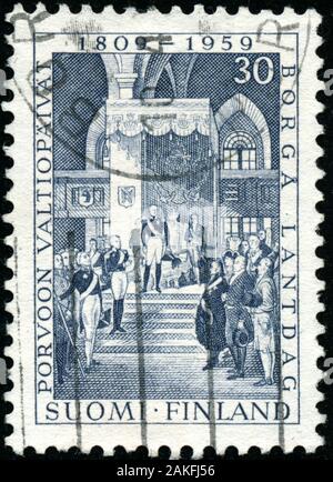 POLTAVA, UKRAINE - Janvier 9, 2020. Vintage de timbres en Finlande montrent circa 1959 150e anniversaire de l'inauguration de la Diète de Porvoo Banque D'Images