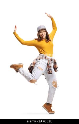 Portrait d'une jeune femme danse avec les bras levés isolé sur fond blanc Banque D'Images