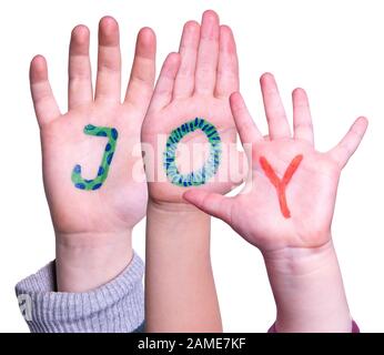 Enfants Mains Construire La Joie Colorée De Mot. Arrière-Plan Blanc Isolé Banque D'Images