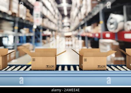 Boîtes en carton sur rouleaux transporteurs à l'intérieur d'un entrepôt prêtes à être expédiées par coursier pour distribution Banque D'Images