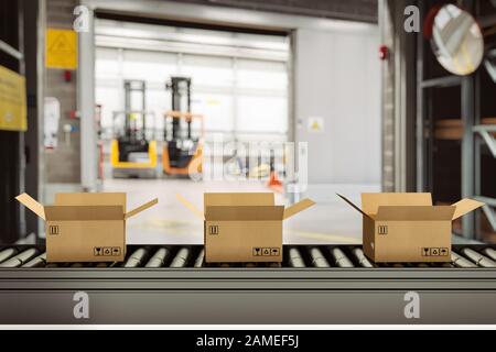Boîtes en carton sur rouleaux transporteurs à l'intérieur d'un entrepôt prêtes à être expédiées par coursier pour distribution Banque D'Images