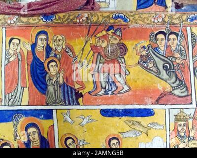 Peintures murales religieuses narratives à Uhra Kidane Mehret, situé sur la péninsule de Zeghe, en face de Bahar Dar. Ethiopie Banque D'Images