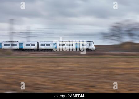 Govia Thameslink ( RTM ) class 700 à Kempston sur le Midland mainline avec un train de Brighton à Bedford Banque D'Images