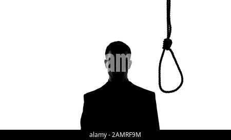 Silhouette masculine debout près de la boucle, va commettre le suicide par pendaison Banque D'Images