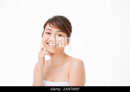 Belle fille asiatique avec le joli sourire sur son visage. Soins de la clinique de beauté et spa concept chirurgie Banque D'Images