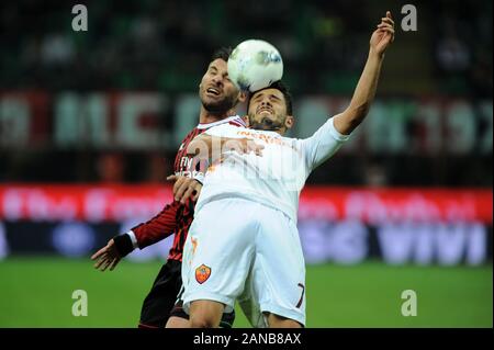 Milan, Italie, 24 mars 2012, 'G.Meazza San Siro Stadium ', un championnat de football sérieux 2011/2012, l'AC Milan - AS Roma : Marquinho et Antonio Nocerino en action pendant le match Banque D'Images