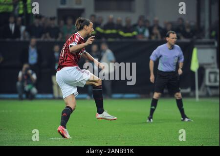 Italie Milan, 28 septembre 2011," G.MEAZZA SAN SIRO -' Stadium, Ligue des champions 2011/2012 , AC Milan - FC Viktoria Plzen : Zlatan Ibrahimovic tirer le coup de pied de pénalité et célèbre après l'objectif Banque D'Images