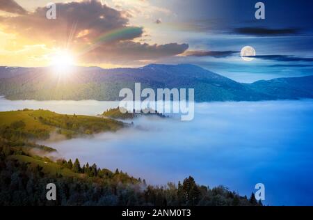 Notion de changement de temps avec soleil et lune au-dessus de paysages montagneux. vallée pleine de brouillard en hausse. Les feuilles vertes sur les arbres. merveilleuse nature paysages de sp Banque D'Images