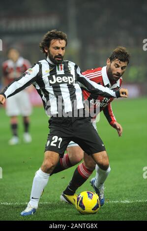 Milan, Italie , 25 novembre 2012, 'G.Meazza San Siro Stadium, ' Campionato di Calcio Série A 2012/2013, l'AC Milan - FC Juventus : Andrea Pirlo et Antonio Nocerino en action pendant le match Banque D'Images