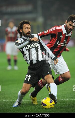 Milan, Italie , 25 novembre 2012, 'G.Meazza San Siro Stadium, ' Campionato di Calcio Série A 2012/2013, l'AC Milan - FC Juventus : Andrea Pirlo et Antonio Nocerino en action pendant le match Banque D'Images