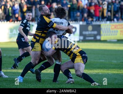 Joe Mellor de Toronto Wolfpack abordés par Paul Mcshane et Jake Trueman de Castleford Tigers Banque D'Images