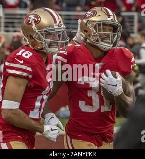 Santa Clara, Californie, États-Unis. 19 Jan, 2020. San Francisco 49ers wide receiver Dante Pettis (18) célèbre avec touchdown suivi verso Raheem Mostert (31) le dimanche, Janvier 19, 2020, au stade de Lévis à Santa Clara, en Californie. Les 49ers défait les packers 37-20 dans le NFC Championship match. Crédit : Al Golub/ZUMA/Alamy Fil Live News Banque D'Images