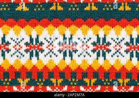 Pull de noël avec texture bigarrée. Texture tricot coloré Banque D'Images