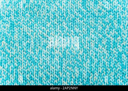 La texture d'un bleu turquoise de bonneterie. Fond chandail Banque D'Images
