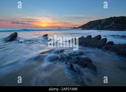 Dollar Cove Sunset Cornwall Gunwalloe Banque D'Images