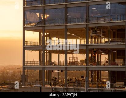 Coucher de soleil sur Unity Square Development à Nottingham City South Side, Notinghamshire Angleterre Royaume-Uni Banque D'Images