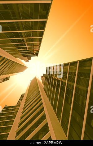 deux gratte-ciel identiques dans la vue de dessous de teinte jaune. rendu tridimensionnel Banque D'Images