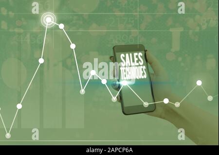 Rédaction de texte écriture manuscrite Techniques de vente. Méthodes photo conceptuelles utilisées par les professionnels de la vente pour créer des revenus Banque D'Images