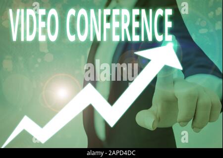 Écriture conceptuelle de la main montrant la visioconférence. Concept signification affichée dans les lieux distants pour les réunions face à face Banque D'Images