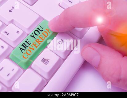 Signe texte montrant Êtes-vous couvert Question. Texte photo d'affaires montrant demandant s'ils avaient au travail ou la vie Banque D'Images