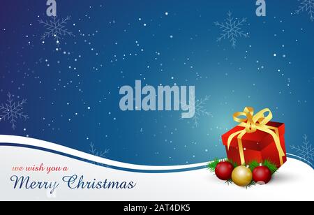 Nous vous souhaitons un joyeux noël. Paysage de neige de Noël sur fond bleu et blanc, fond d'hiver avec cadeau Banque D'Images