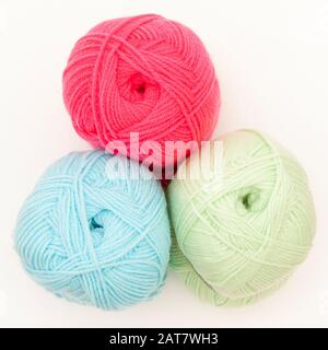 Three Balls of coloured wool on white background Banque D'Images