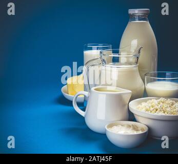 Produits laitiers on blue background Banque D'Images