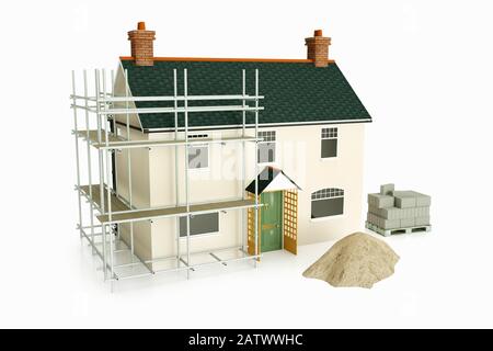 Construction de maisons - modèle d'une vieille maison individuelle britannique traditionnelle ayant des travaux de construction de bâtiments effectués Banque D'Images