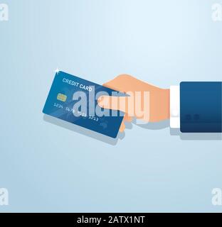 Hand holding credit card Banque D'Images