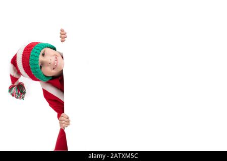 Le Père Noël puit sur un panneau. Concept de vacances de Noël. Enfant de Noël Banque D'Images