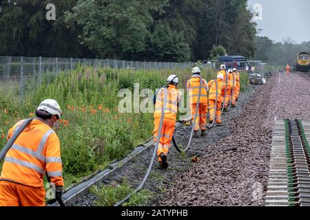 Pose de câbles par chemin de fer Banque D'Images