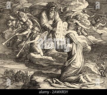 Exode. Dieu dépose la loi. Moïse reçoit les 10 commandements sur le Mont Sinaï. Histoire biblique sacrée ancien Testament. Ancienne gravure du livre Historia Banque D'Images