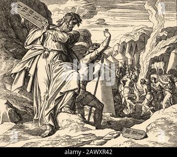 Exode. Dieu dépose la loi. Moïse brise les tables de témoignage. Histoire biblique sacrée ancien Testament. Ancienne gravure du livre Historia Sagrada 1920 Banque D'Images