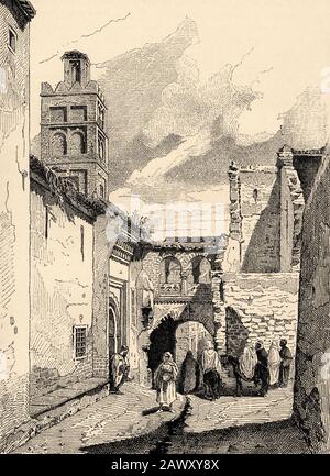 Vue sur la rue à Tlemcen, Algérie. Afrique Du Nord. Ancienne illustration de gravure du livre Nueva Geografia Universal par Eliseo Reclus 1889 Banque D'Images