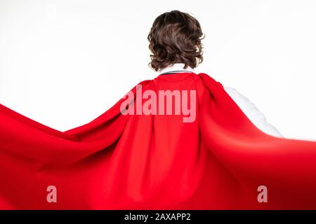 Vue arrière de l'homme d'affaires en super-héros rouge caout isolé sur fond blanc Banque D'Images