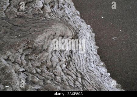 Formation de sable et de glace au lac Banque D'Images