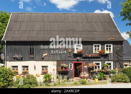 Magasin agricole et café à Gohrisch, montagnes d'Elbe Sandstone, parc national de la Suisse saxonne, Saxe, Allemagne Banque D'Images