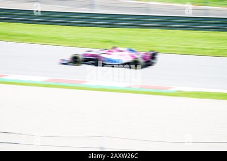 F1 Race car, passe très rapidement, sport automobile, fond flou, photo de course Banque D'Images