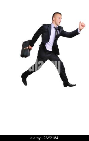 Portrait of a businessman running away against white background Banque D'Images