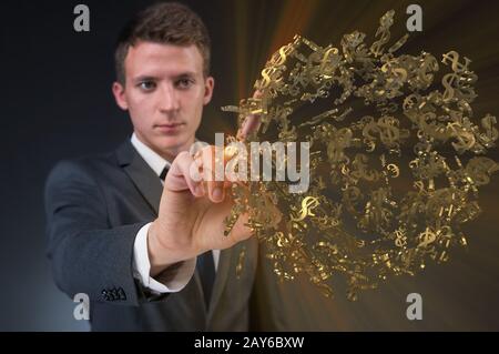 L'homme en appuyant sur le bouton virtuel avec des dollars Banque D'Images